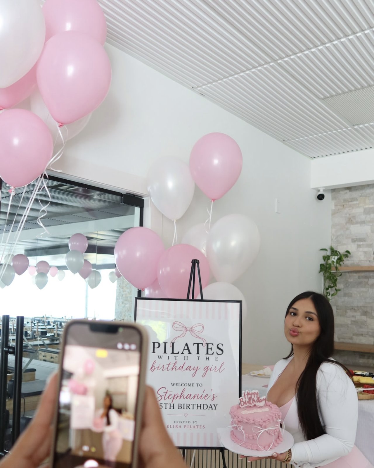 Birthday celebration with cake at Elira Pilates